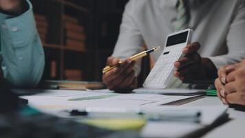 Finance manager meeting discussing company growth project success financial statistics, professional investor working start up project for strategy plan with document, laptop and digital tablet. video