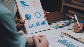 Finance manager meeting discussing company growth project success financial statistics, professional investor working start up project for strategy plan with document, laptop and digital tablet. video
