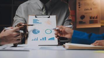 Finance manager meeting discussing company growth project success financial statistics, professional investor working start up project for strategy plan with document, laptop and digital tablet. video