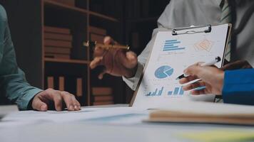 Finance manager meeting discussing company growth project success financial statistics, professional investor working start up project for strategy plan with document, laptop and digital tablet. video
