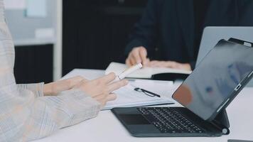 Finance manager meeting discussing company growth project success financial statistics, professional investor working start up project for strategy plan with document, laptop and digital tablet. video