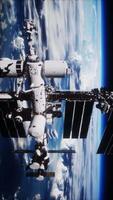 Iss pris avec le Terre dans le Contexte dans le espace, verticale video