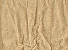 Brown wrinkle recycle paper background photo