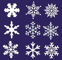 conjunto de siluetas de invierno copos de nieve vector