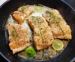 Fresh Salmon filet with herbs and spices photo