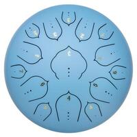 blue steel tongue drum with tone stickers, top view, isolated on white photo