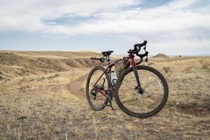 gravel bike on a single track trail in Colorado foothills - Soapstone Prairie Natural Area in early spring scenery photo