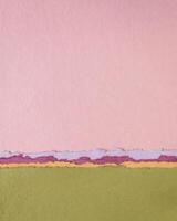 abstract paper landscape in pink and green pastel tones - collection of handmade rag papers photo