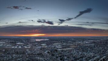 winter sunrise over midtown of Fort Collins and plains in northern Colorado, aerial panorama photo