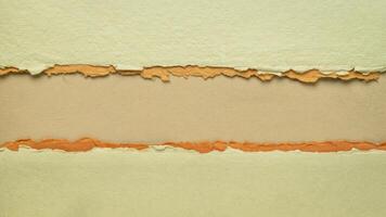 paper abstract in green, orange and brown with a copy space, blank web banner photo