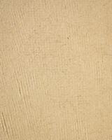 background of beige handmade textured paper crafted in Mexico photo