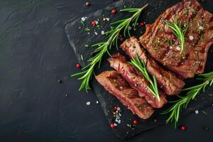 AI generated Roasted beef steak on dark stone background with rosemary herbs. Top view, generative ai photo