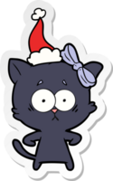 hand drawn sticker cartoon of a cat wearing santa hat png