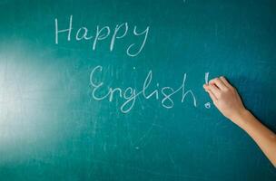 Inglés lección, escuela, aprender exterior idioma. pizarra verbo tiempos verbales gramática. foto