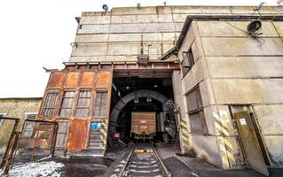 Train in warehouse. Ready for loading. Railway station concept. photo