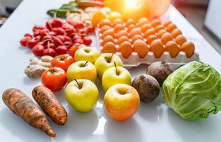 Top view of mixed vegetables. Reddish in front. Organic food concept. Stay healthy. Fresh products consuming. photo