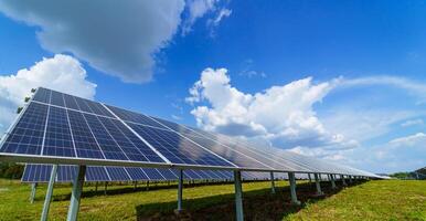 Solar panel on sky background. Photovoltaic power supply systems. Solar power plant. The source of ecological renewable energy. photo