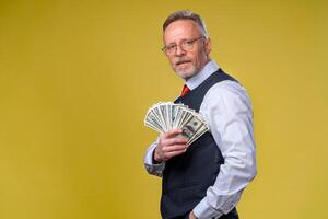 Portrait of very excited man with bunch of money. Lucky day. Human emotions and facial expressions photo