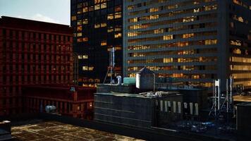 A view of a city at night from the roof of a building video