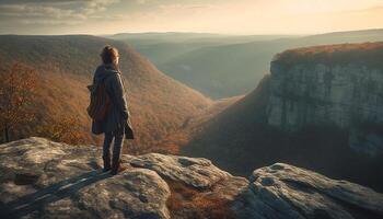 AI generated One person standing on top of mountain peak, enjoying nature generated by AI photo