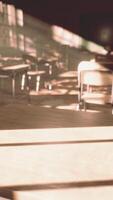 View to classroom with tables and small blackboard and grungy walls video