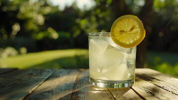 AI generated Refreshing Lemonade Served on Rustic Table with Lemon Slice and Ice Capturing Tranquil Garden Background photo