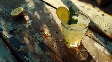 AI generated Refreshing Iced Lemonade Garnished with Lemon and Mint Set Against Bright Outdoor Patio Background photo