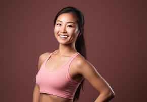 AI generated Beautiful Young Asian Woman Showcasing Strength and Determination in Dynamic Workout Poses, Fitness Session, Isolated Against a studio Background photo