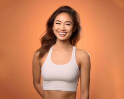 AI generated Beautiful Young Asian Woman Showcasing Strength and Determination in Dynamic Workout Poses, Fitness Session, Isolated Against a studio Background photo