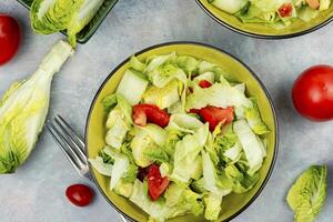 Spring salad of raw fresh vegetables. photo