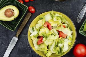 Spring salad of raw fresh vegetables. photo