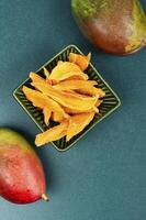 Dehydrated mango or dried mango slices. photo