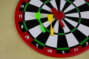 Magnetic dartboard with plastic colorful darts, children game with points, target throwing toy photo