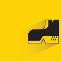 boot icon with shadow on yellow background vector