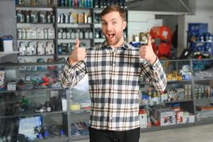 Smiling Salesman Auto Parts Store photo