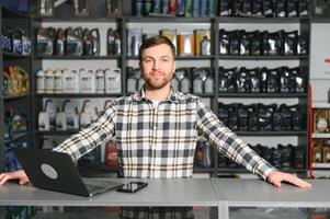 Smiling Salesman Auto Parts Store photo