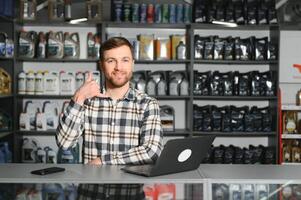 Smiling Salesman Auto Parts Store photo