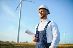 Windmill engineer inspection and progress check wind turbine photo