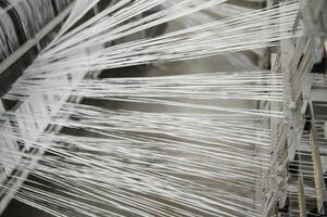 Production of polypropylene yarn for making bags. photo