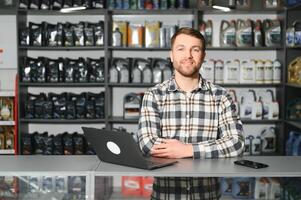 Smiling Salesman Auto Parts Store photo