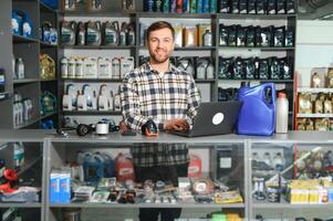 Smiling Salesman Auto Parts Store photo