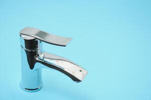 New chrome or steel mixer tap for bathroom sinks photo