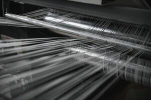 Weaving machines of the factories. Production of textiles. photo