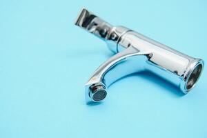 New chrome or steel mixer tap for bathroom sinks photo