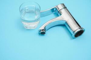 New chrome or steel mixer tap for bathroom sinks photo