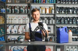 Smiling Salesman Auto Parts Store photo