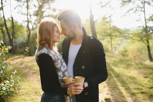 Happy young couple in love at the park photo