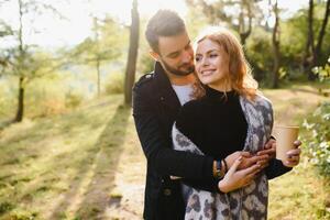 Happy young couple in love at the park photo