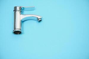 Double handle water tap. New chrome or steel mixer tap photo