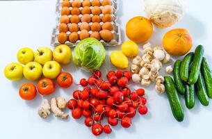 Top view of mixed vegetables. Reddish in front. Organic food concept. Stay healthy. Fresh products consuming photo